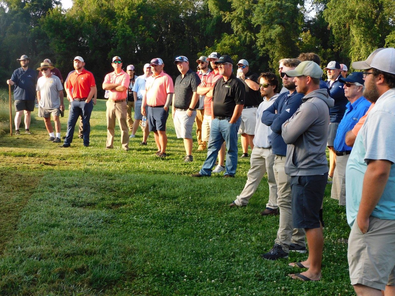 A crowd watches a presentation during the Turfgrass Research Field Day and Expo.