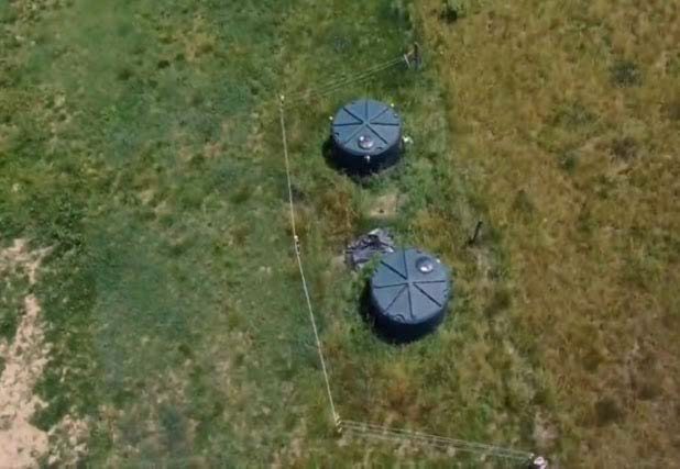 Overhead View of Two Plastic Reservoir Tanks
