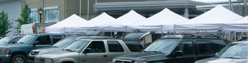 a photo of trucks outside of a building