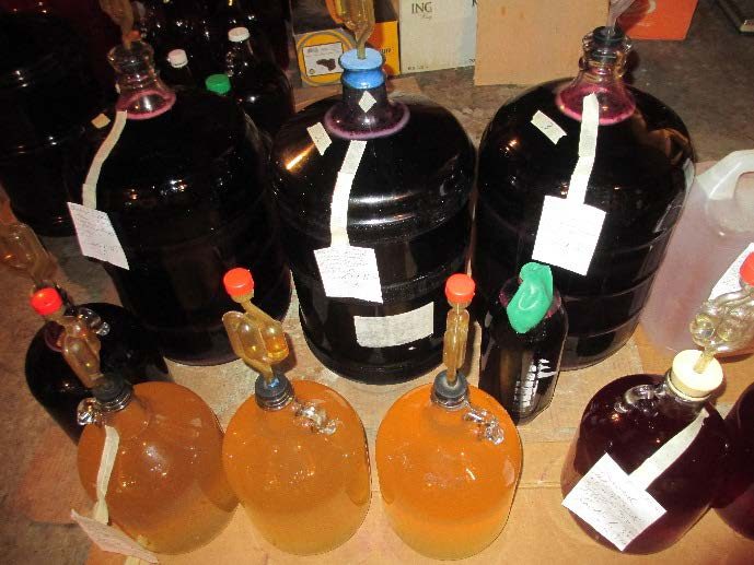 Several large bottles of liquid