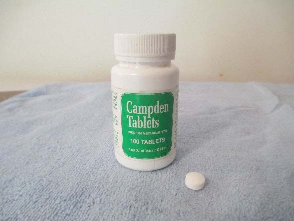 A white pill bottle labeled Campden Tablets.
