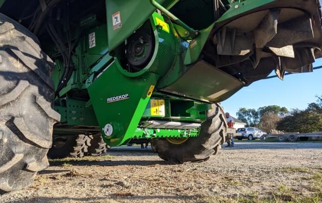 The Redekop Seed Control Unit mounted on a John Deere combine. (Rectangle)