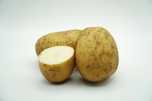 Close up of a cut up potato.