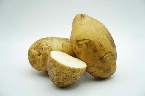 Close up of a cut up potato.