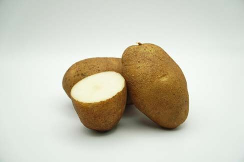 Close up of a cut up potato.