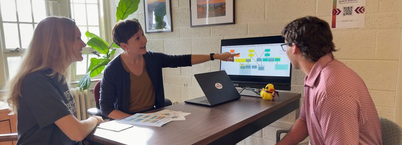 Paige advising with students